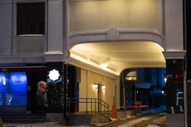 istock Arch, passage through the city house. Evening, winter 1783588346