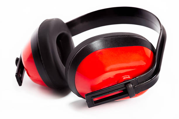 Red and black noise blocking headphones stock photo
