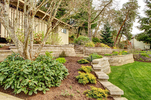 istock Spring Landscape with retaining walls and garage. 178359670