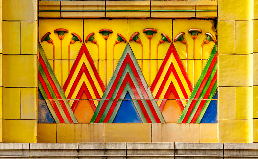 Egyptian style art deco tiles with flowers and pyramids outside Carlton Cinema, Islington, London