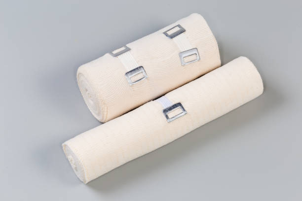 istock Two rolls of different woven elastic medical bandages with clips 1783603482