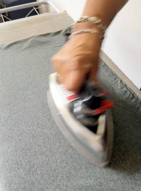 istock Senior Hispanic woman ironing at home 1783604112