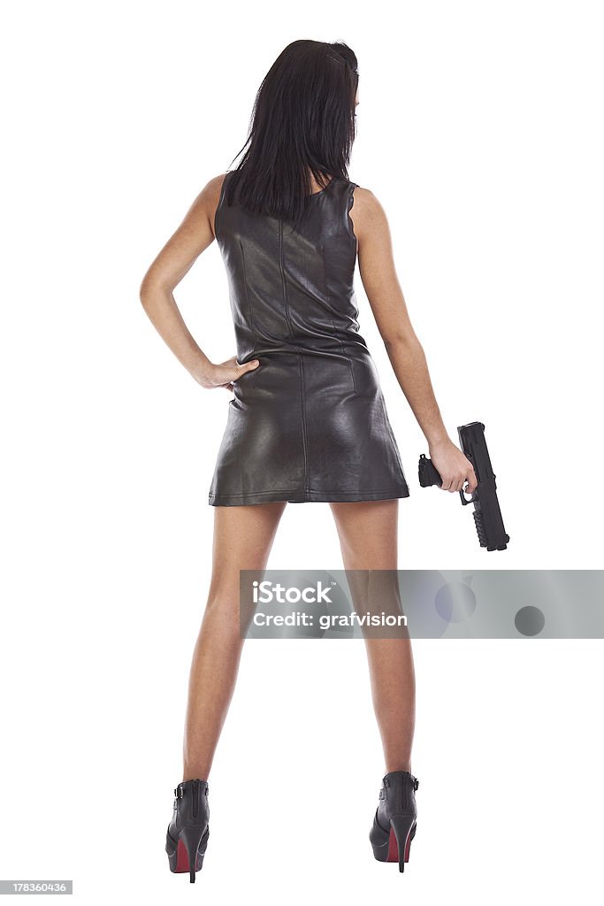 Mulher com uma arma nas mãos - Foto de stock de Arma de Fogo royalty-free