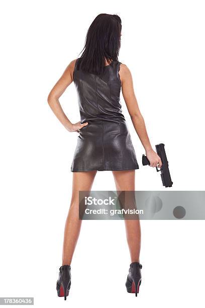 Foto de Mulher Com Uma Arma Nas Mãos e mais fotos de stock de Arma de Fogo - Arma de Fogo, Cabelo Castanho, Figura para recortar