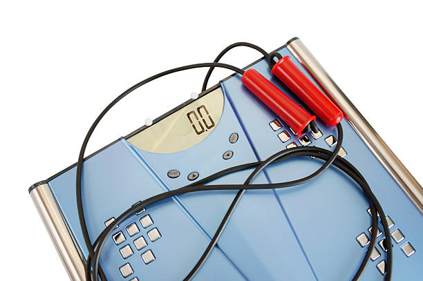 istock Skipping rope and scales on a white background 178360529