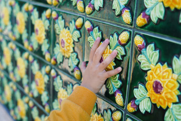 Traditional portuguese tile Azulejo and hand