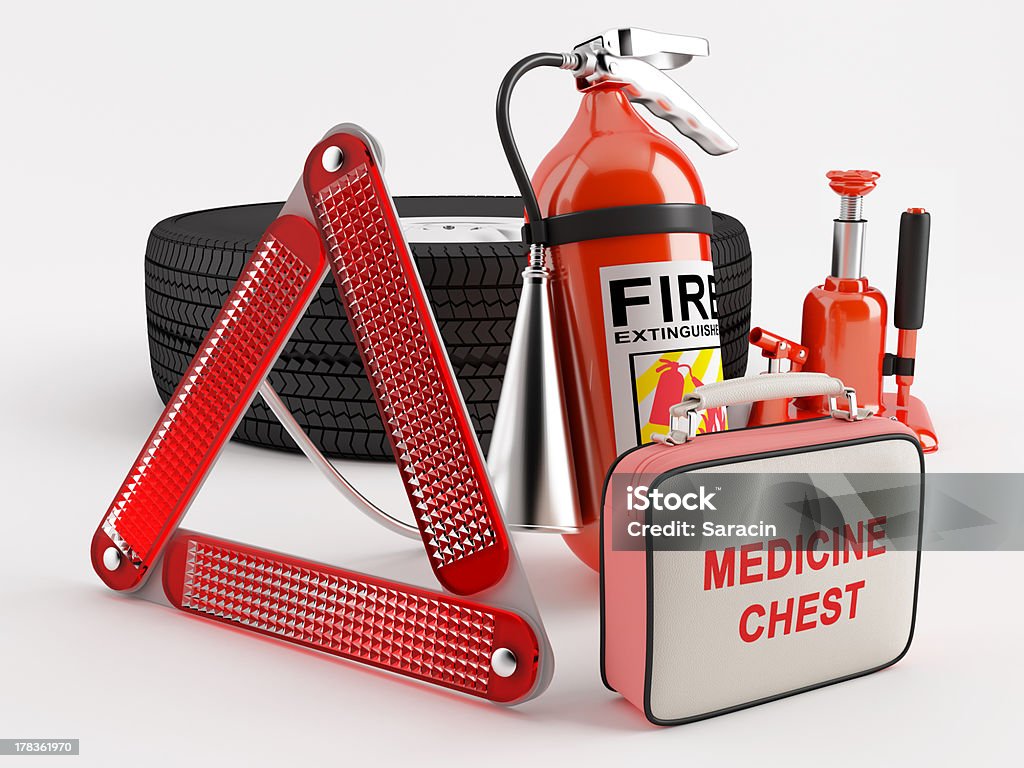 Set of basic necessities "A set consisting of a wheel, fire extinguisher, first aid kit, warning triangle and jack" First Aid Kit Stock Photo