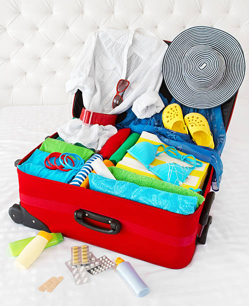 istock Travel suitcase packed for vacation with personal belongings 178362306