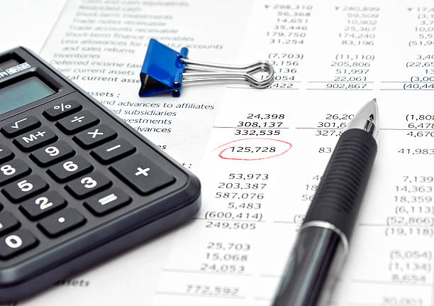 istock Financial report with calculator and pen 178362533