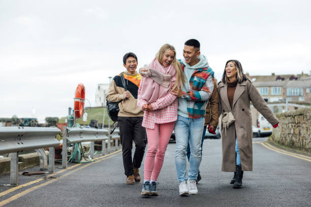 istock Walking Along the Harbour with Friends 1783630656