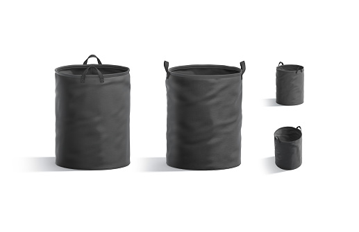 Blank black laundry hamper bag mockup, front and profile view, 3d rendering. Empty fabric storage bucket for domestic chore mock up, isolated. Clear laundering foldable basket for clothing template.