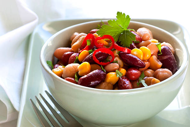Bean and Corn Salad with Chili Three bean and corn salad with chili.  Delicious vegetarian eating. kidney bean stock pictures, royalty-free photos & images