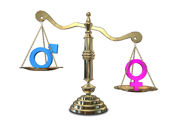 гендерное неравенство балансируя шкала - gender symbol scales of justice weight scale imbalance стоковые фото и изображения