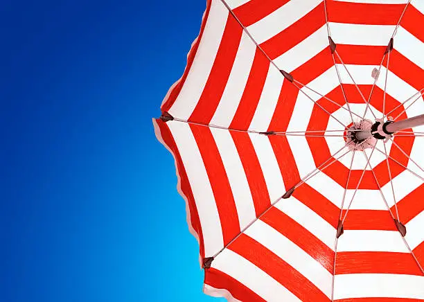 Red umbrella in the mediterranean sea