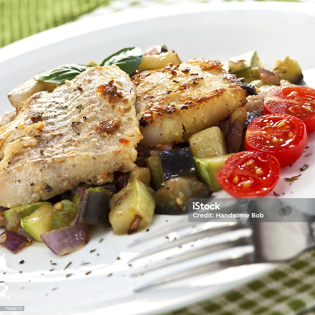 fish plate of fish meat Basil Stock Photo