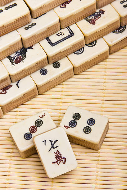 istock Old chinese game mahjongg on bamboo mat background 178365496