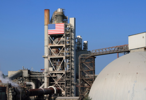 A patriotic cement plant displays the stars and stripes.