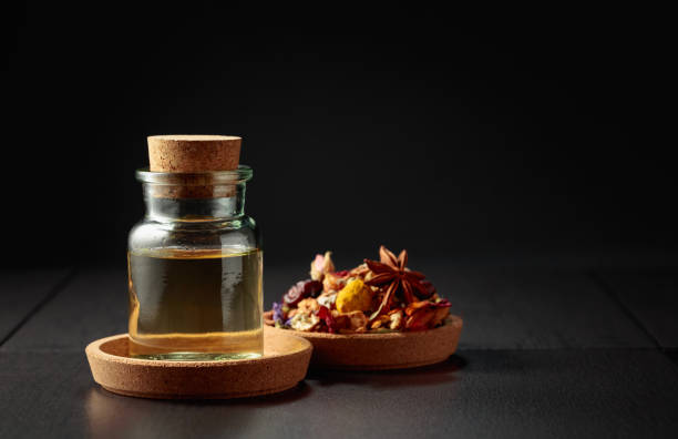 istock Essential oil or herbal tincture in a glass bottle. 1783665166