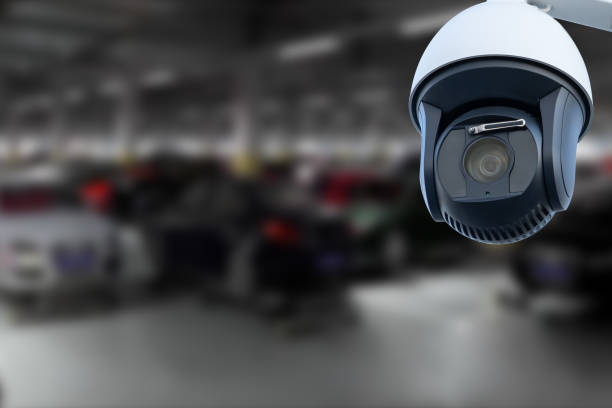 istock CCTV Camera Operating in car park building. Copy space. 1783666398