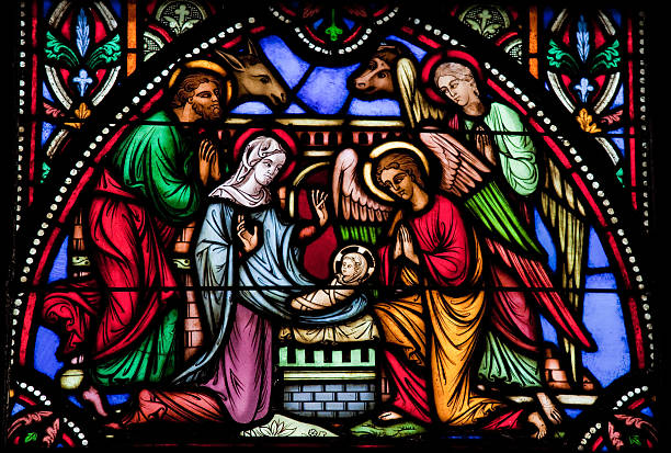 Nativity Scene Nativity Scene on Christmas. This window is located in the cathedral of Brussels. nativity scene stock pictures, royalty-free photos & images