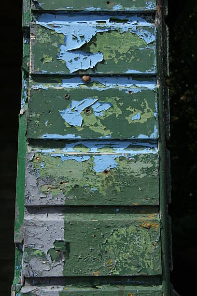 Blue and green weathered paint stock photo