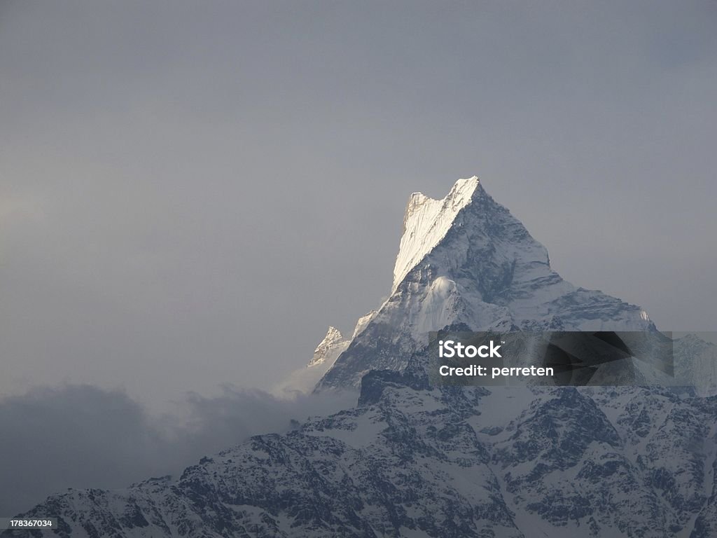 Peak of famous Machapuchare "Machapuchare, also known as Fish Tail mountain. Annapurna range, Nepal." Annapurna Conservation Area Stock Photo