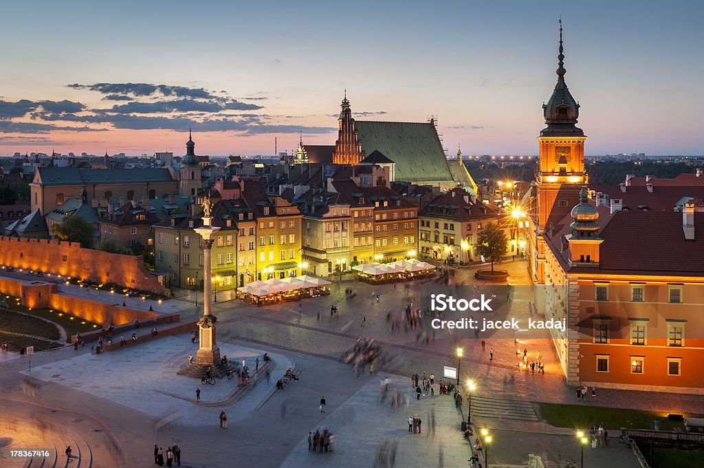 Night panorama of Royal Castle in Warsaw Night Panorama of Royal Castle and Old Town in Warsaw, Poland Architectural Column Stock Photo