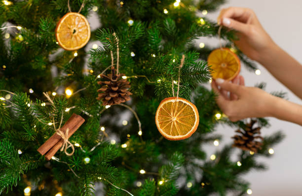istock Christmas tree with dried oranges, cones and cinnamon sticks 1783678516