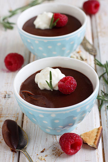 istock Chocolate rosemary mousse with whipped cream and raspberry 178367936