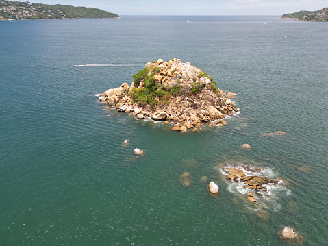 Horizontal Aerial View: El Morro Islet in Acapulco - Scenic Drone Capture