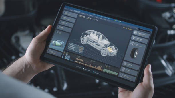 il tecnico maschio tiene la tavoletta con la simulazione della diagnostica e dell'aerodinamica dell'automobile - industria dellautomobile foto e immagini stock