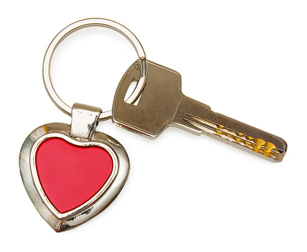 istock Metal key with red heart keychain isolated on white 178368301