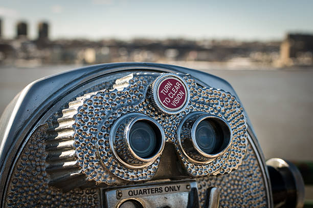 istock Tourist binoculars with city in background 178368395