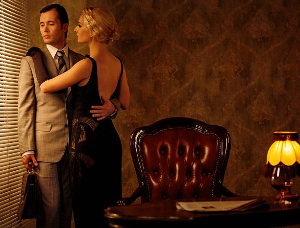 istock Couple in retro interior near a window 178368651