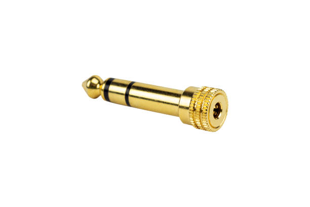 istock Adapter Ugreen 6.5 mm plug to 3.5 mm jack audio adapter, isolated from background 1783688489