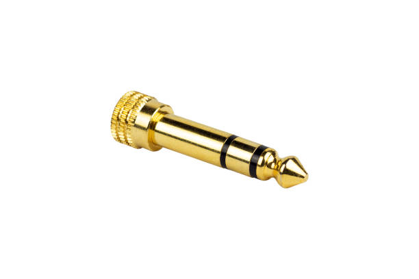 istock Adapter Ugreen 6.5 mm plug to 3.5 mm jack audio adapter, isolated from background 1783688492
