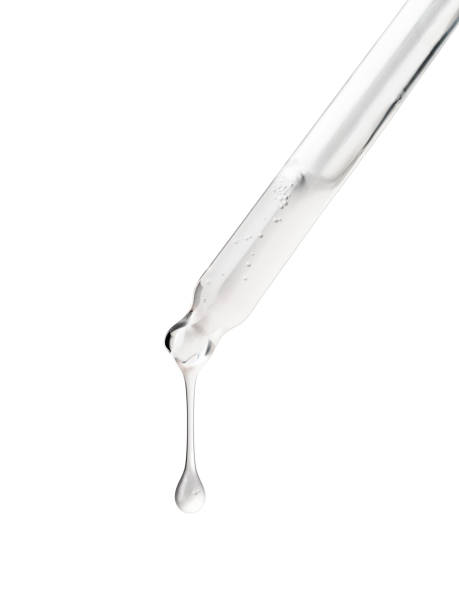 istock Clear essential serum oil dripping isolated 1783689149