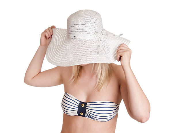 woman with bikini and sun hat