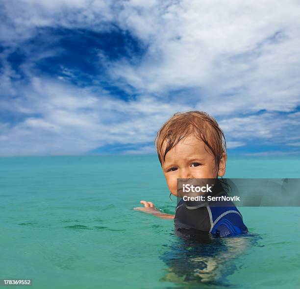 Cute Kid In Wetsuit Stock Photo - Download Image Now - 12-17 Months, 2-3 Years, Asking