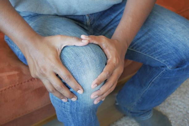 istock Close up on man suffering knee joint pain 1783698430