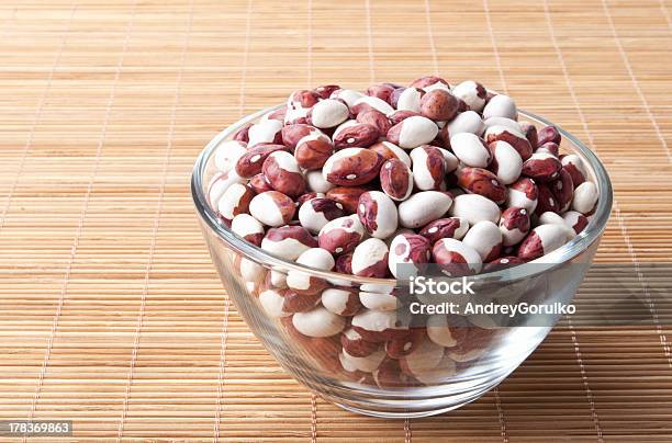 Glass Bowl Full Of Beans Stock Photo - Download Image Now - Bamboo - Material, Bean, Bowl
