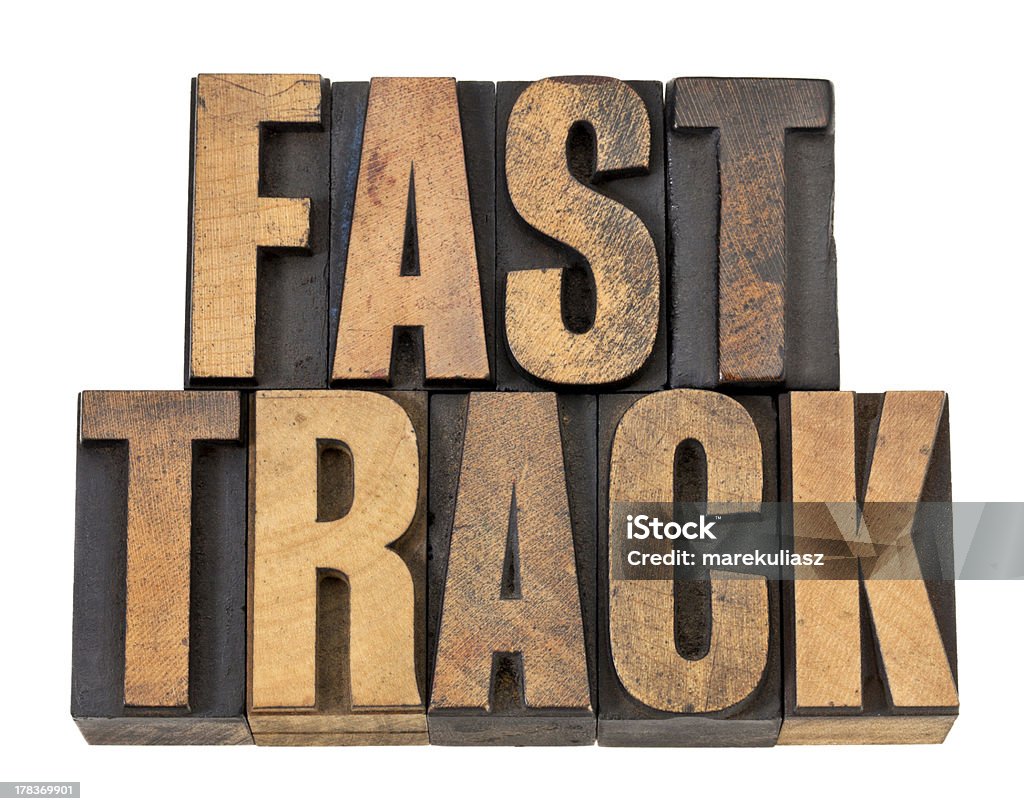 fast track Worte in Holz-Art - Lizenzfrei Altertümlich Stock-Foto