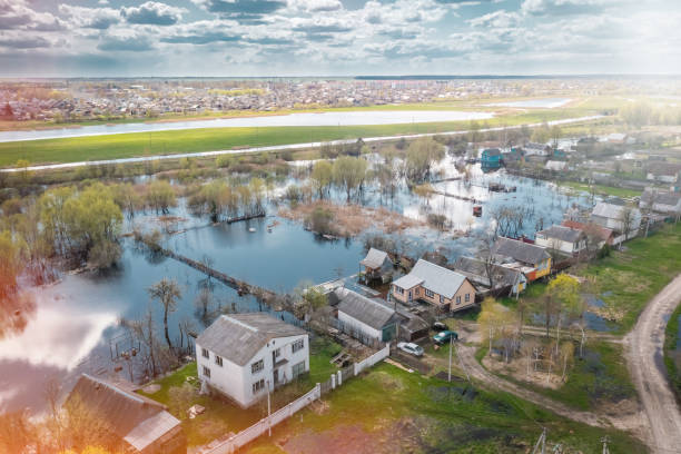 istock Flooded private houses in spring in countryside 1783703396
