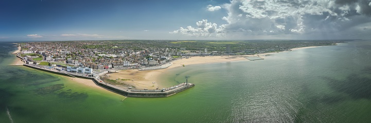 An aerial view of Margate Beach and Harbour Arm on a sunny day. Kent, England