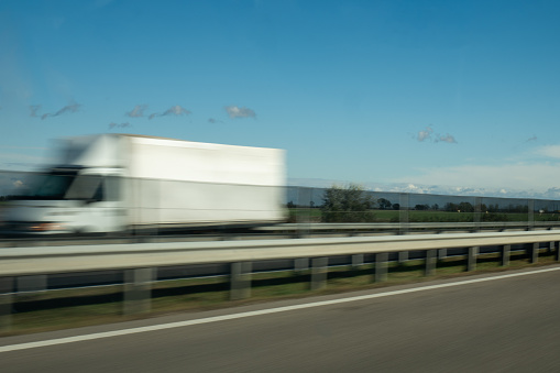 Traffic on highway, motion blur.