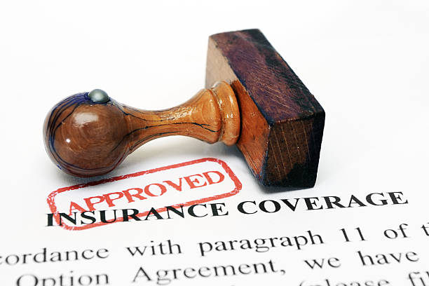 istock A brown wooden approval stamp for insurance coverage 178370841