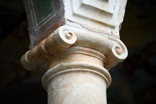 Pillar column ancient greek stone marble, ionic style pedestal, isolated against white color background, vertical. 3d illustration