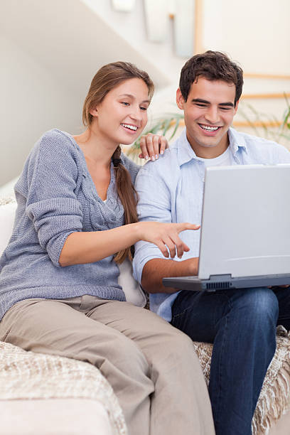 istock Portrait of couple using laptop 178371369