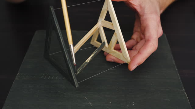 Painting a Balancing Wooden Puzzle with Ice Cream Sticks