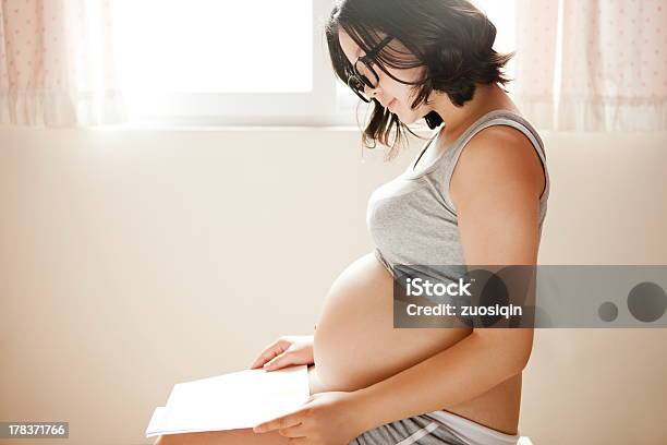 Pregnant Woman Stock Photo - Download Image Now - Pregnant, Japan, Reading